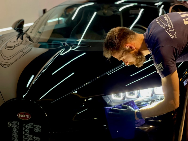 Ceramic coating being applied to car paint